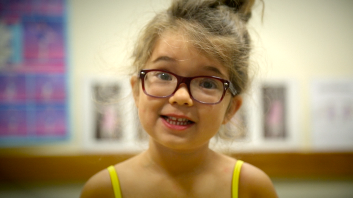 young girl with glasses